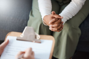 Cropped shot of an unrecognisable woman sitting with her doctor during a consultation